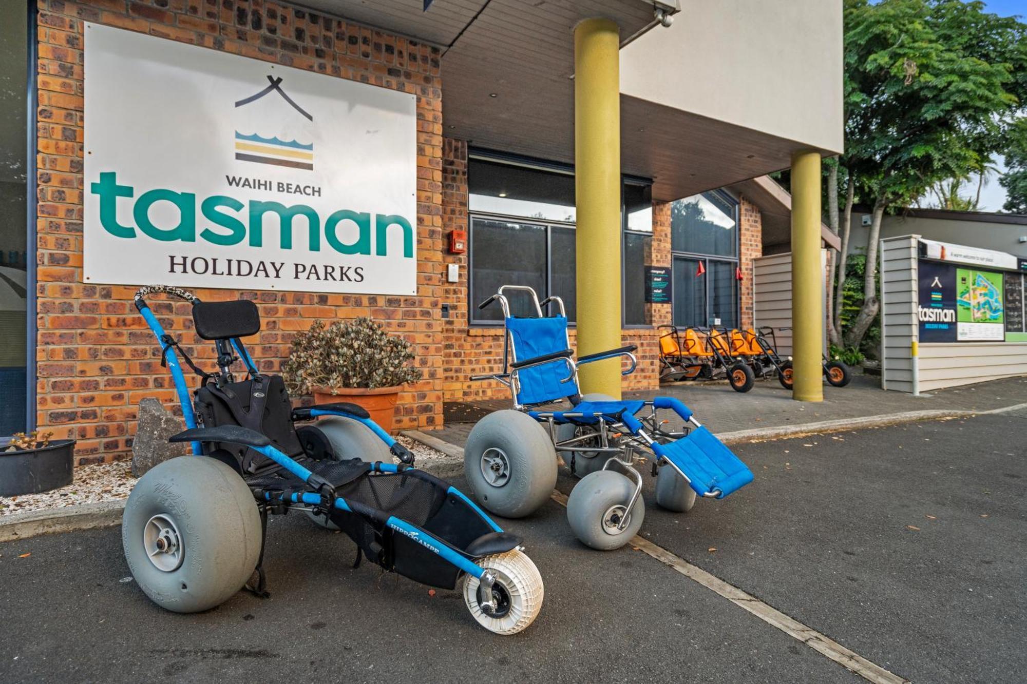 Tasman Holiday Parks - Waihi Beach Esterno foto Beach wheelchairs at a holiday park